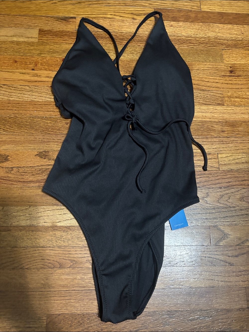 NWT Cupshe solid black one-piece bathing suit with tie up front and cheeky bum